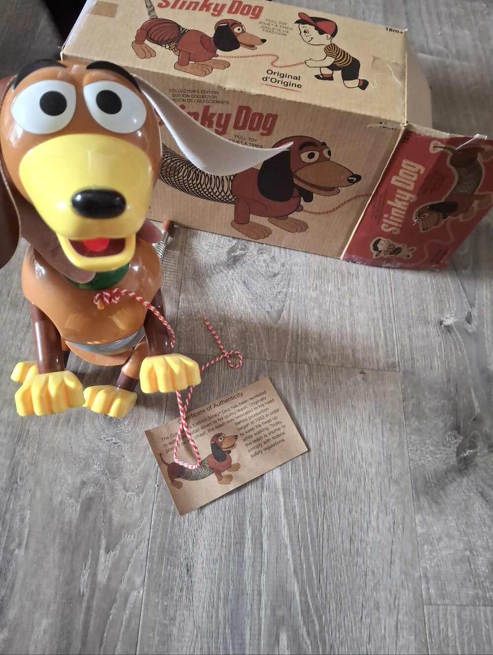 Disney Pixar Slinky Dog pull toy with certificate of authenticity vintage